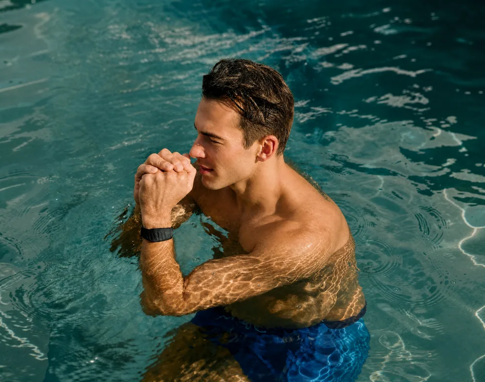 Man in pool after a swim
