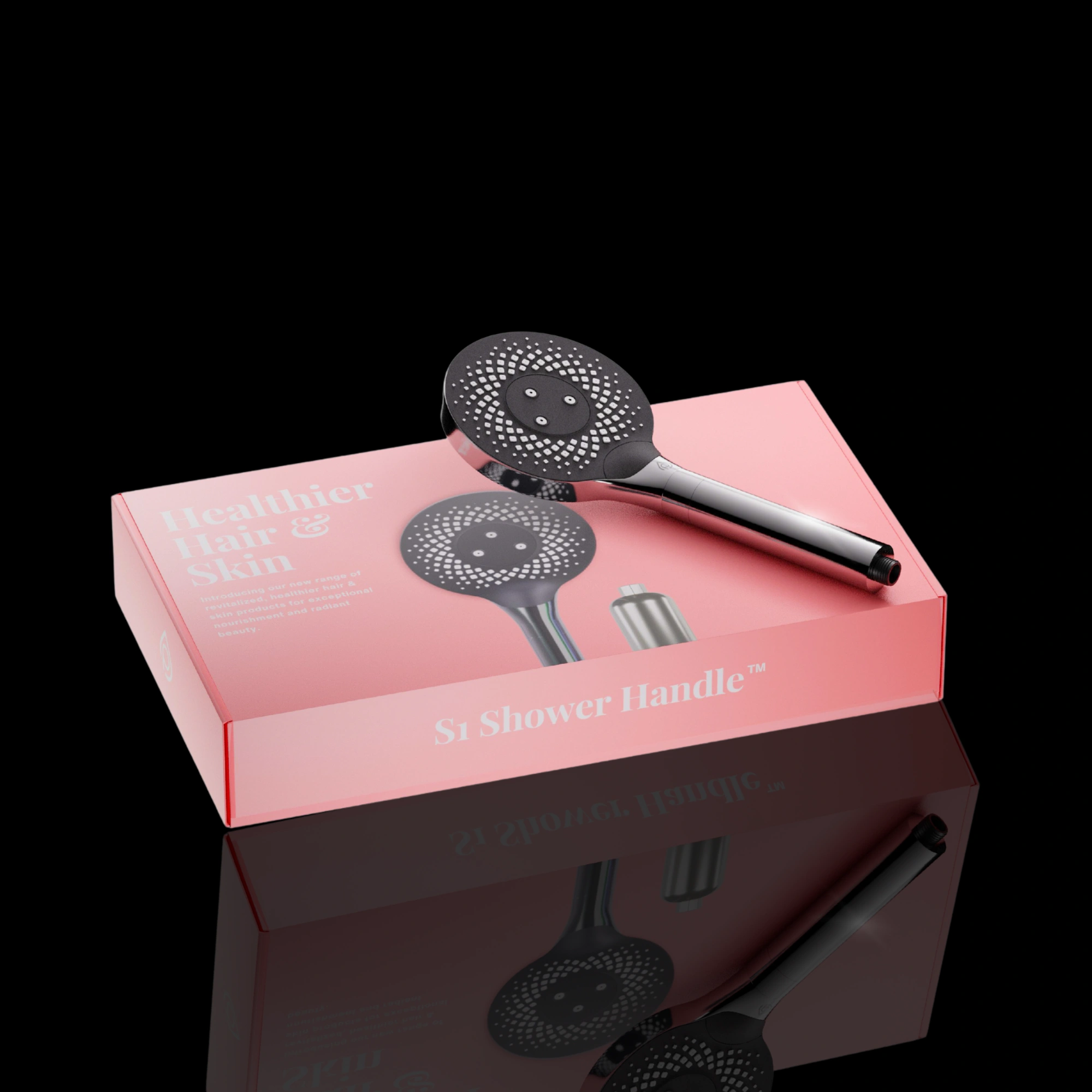 The pink S1 Shower Handle retail box — Healthier Hair & Skin — with the black handle resting on top